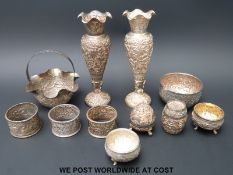 A quantity of Burmese and similar white metal items to include one with a bear to underside (575g)