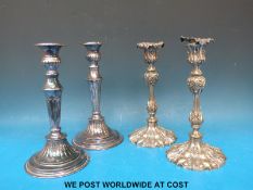 A pair of Elkington & Co silver plated candlesticks in the neoclassical style,