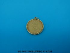 An 1892 Victorian bun head gold full sovereign in 9ct gold mount (9g)