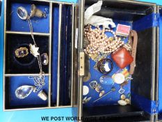A collection of costume jewellery to include a hallmarked silver thimble and bell,