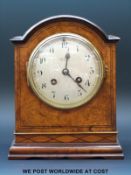 A Walnut cased two train mantel clock marked R.