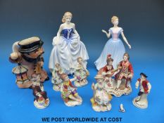 A collection of Royal Doulton and Dresden figures