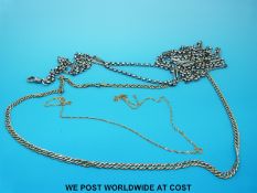 A gold necklace marked 375 (5.