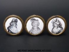 A matching trio of 18thC English Bilston enamel cloak pins or chimney piece knobs,