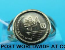 A yellow metal Shekel ring marked 14ct (size K,