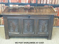 A 17th / 18thC carved oak three panel peg jointed coffer (H63 x W102 x D54cm)
