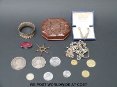 A Victorian crown, a further Victorian silver coin, hallmarked silver napkin ring, star watch key,