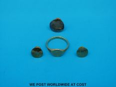 An 18ct gold signet ring and three hallmarked 9ct gold studs (7.