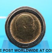 A 9ct gold ring with textured shoulders set with a 1909 gold half sovereign (size M, 12.