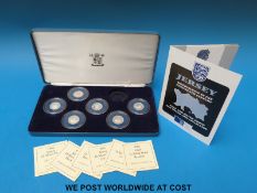 A cased six coin collection of £1 silver proof Jersey Ship Building coins with certificates