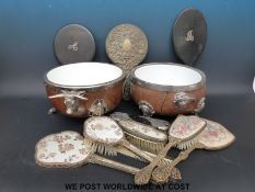 Two ceramic lined wooden bowls decorated with lion masks, on lion paw feet,