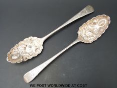 Two Georgian bottom hallmarked silver berry spoons length 22cm