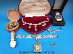 A paste necklace in original box, cufflinks,