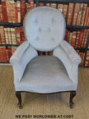 An upholstered 19thC armchair