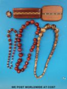 A graduated agate bead necklace, graduated turned horn necklace,