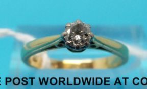 An 18ct gold ring set with a round brilliant cut diamond (size K)