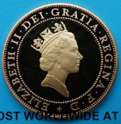 A 1997 gold proof £2 coin, certificate no 0290, 15.