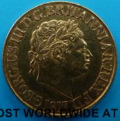 A cased George III 1817 gold full sovereign, VF,