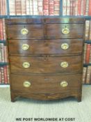 A 19thC bow fronted chest of two over three graduated drawers raised on bracket feet (H94 x W83 x