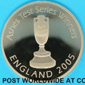 A cased 2005 England's Ashes gold proof crown with certificate no 052 of 123, 39.