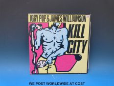 Fourteen original LPs by The Clash and Iggy Pop: “The Clash”; “Give 'Em Enough Rope”;