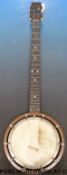 A cased c1920 five string banjo with instruction book