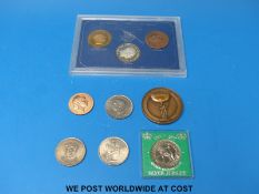 A set of British Commonwealth Games medal coins, comprising gilt bronze, silver and bronze,