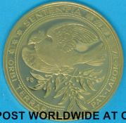 A Kennedy gold medallion or coin, 0.900 (weight 10.