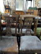 A set of four 19thC mahogany dining chairs with green upholstery seats and a set of four leather