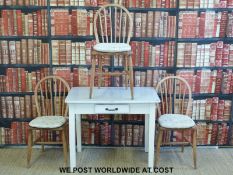 A retro kitchen table and two elm seated Windsor chairs