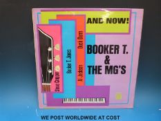 A small collection of 27 LP's and twelve 7