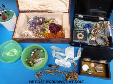A collection of jewellery to include glass beads, brooches, wooden box with silver mounts,