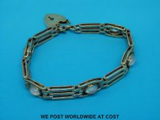 A 9ct gold gate bracelet set with moonstones (25g all in)