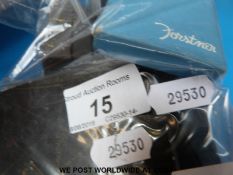 A collection of costume jewellery to include silver pickle fork, silver fob, silver pendant,