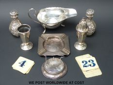 A hallmarked silver sauce boat, Art Deco ashtray,