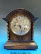 A two train oak cased mantel clock with British Jerome movement,