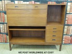 A retro bureau or desk with six various drawers,