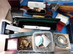 A large collection of costume jewellery to include a pair of pearl stud earrings, a silver bracelet,