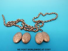 A pair of 9ct gold cufflinks with chased foliate design,