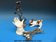 A cast metal figural candlestick, spoons, parian hand,