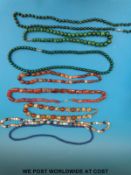 A collection of beaded necklaces to include malachite, a lapis lazuli, two carnelian agate,