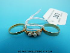 A 22ct gold wedding band,