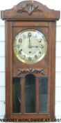 A C1910 wall clock with silvered dial, Arabic numerals, painted spade hands,