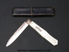 A hallmarked silver and mother-of-pearl Victorian fruit knife in case