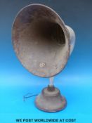 An electric gramophone horn on bakelite base