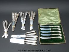 A quantity of various hallmarked silver-handled knives, six different designs,