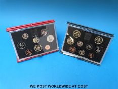Two deluxe proof UK coin sets,