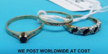 Two 9ct gold rings and a 14ct gold ring,