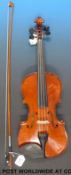 A Stentor Conservatoire single piece (36cm back) cased violin with bow,