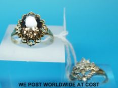 A 9ct gold ring set with diamonds in a cluster and a 9ct gold ring set with a smoky quartz